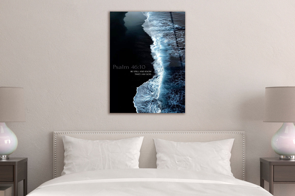 Psalm 46:10 Be Still Ocean Shore Glass Wall Art in a living room interior