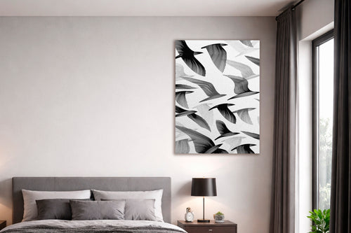 Black and White Flying Birds Glass Wall Art in a modern interior