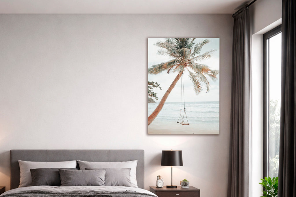 Palm Tree Beach Swing Glass Wall Art in a modern interior