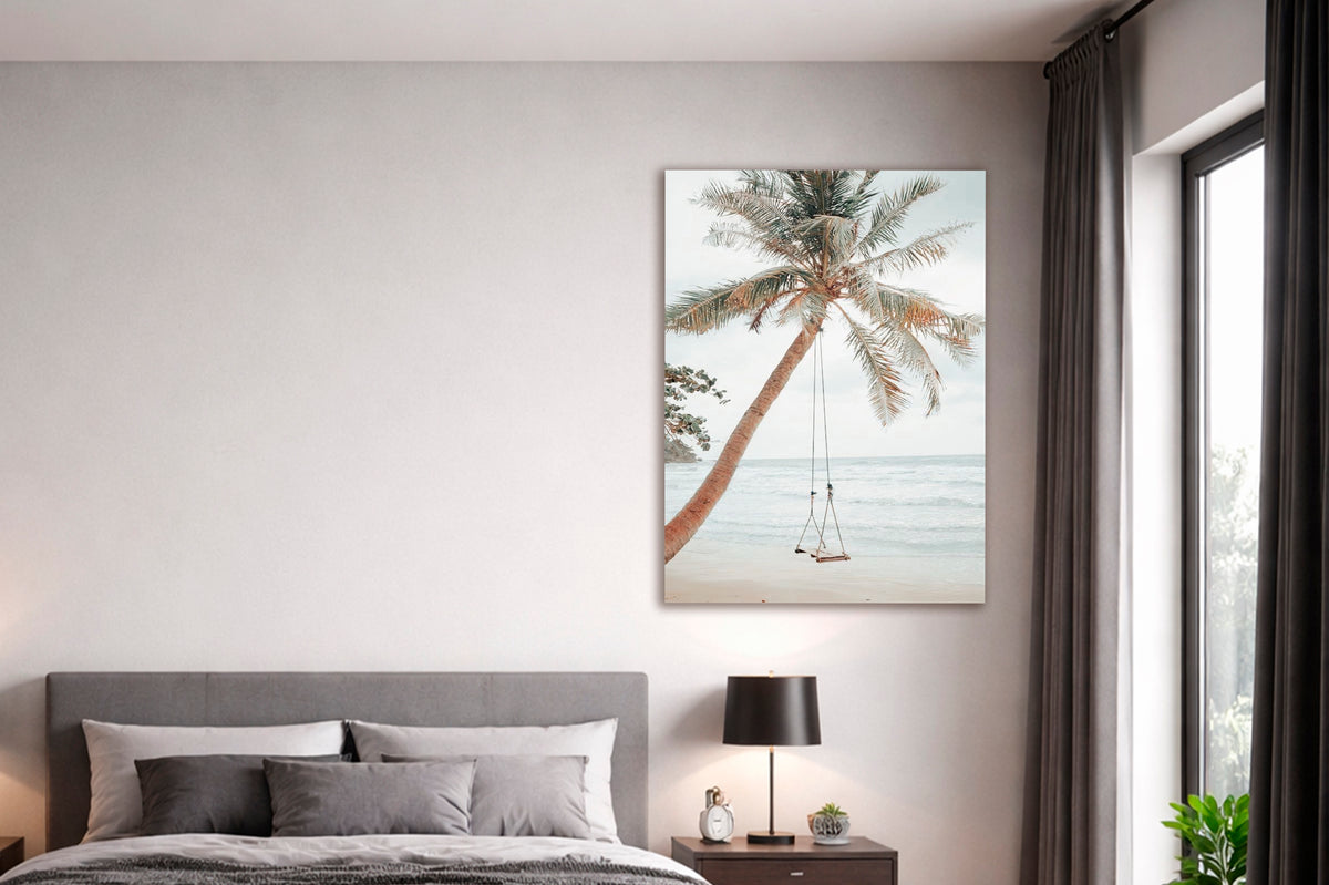 Palm Tree Beach Swing Glass Wall Art in a modern interior
