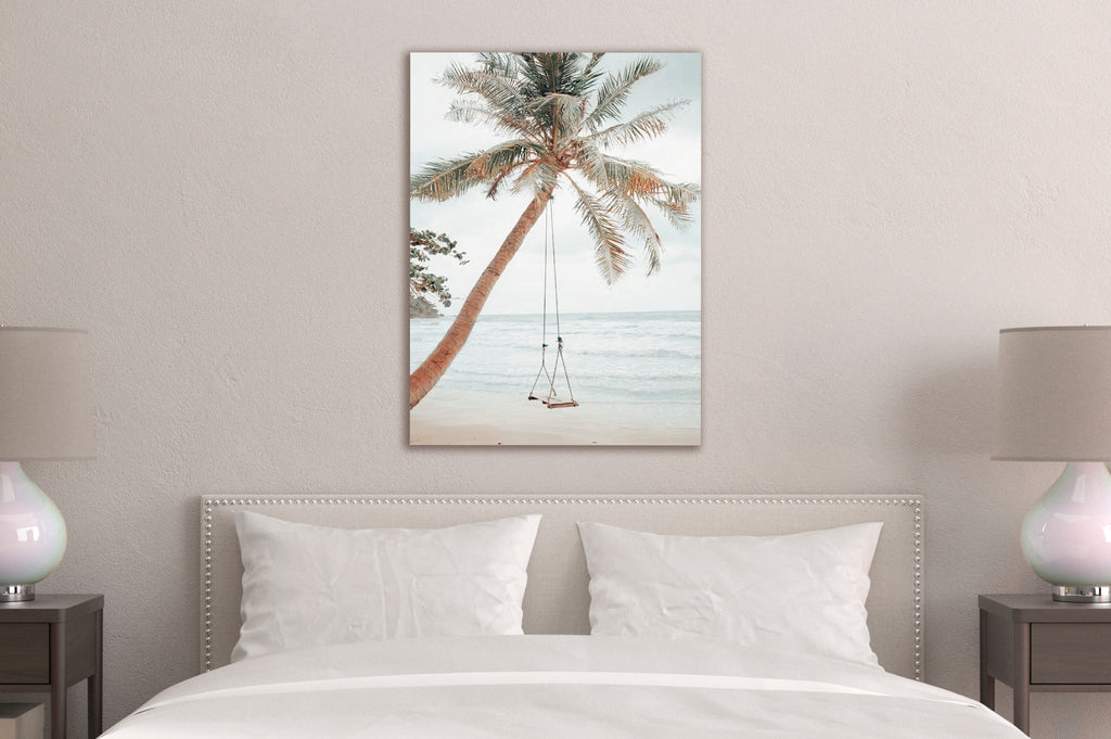 Palm Tree Beach Swing Glass Wall Art on the wall