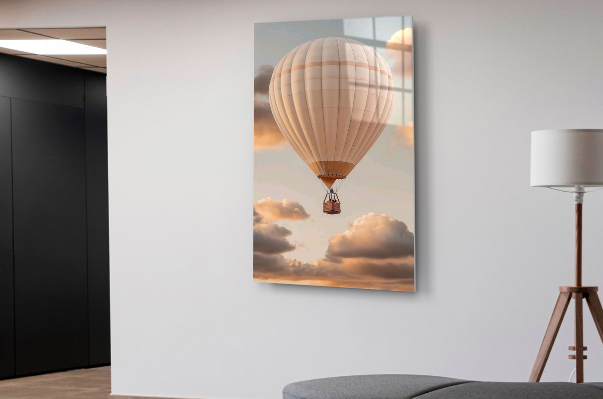 Hot Air Balloon in Peach Clouds Glass Wall Art in a living room interior
